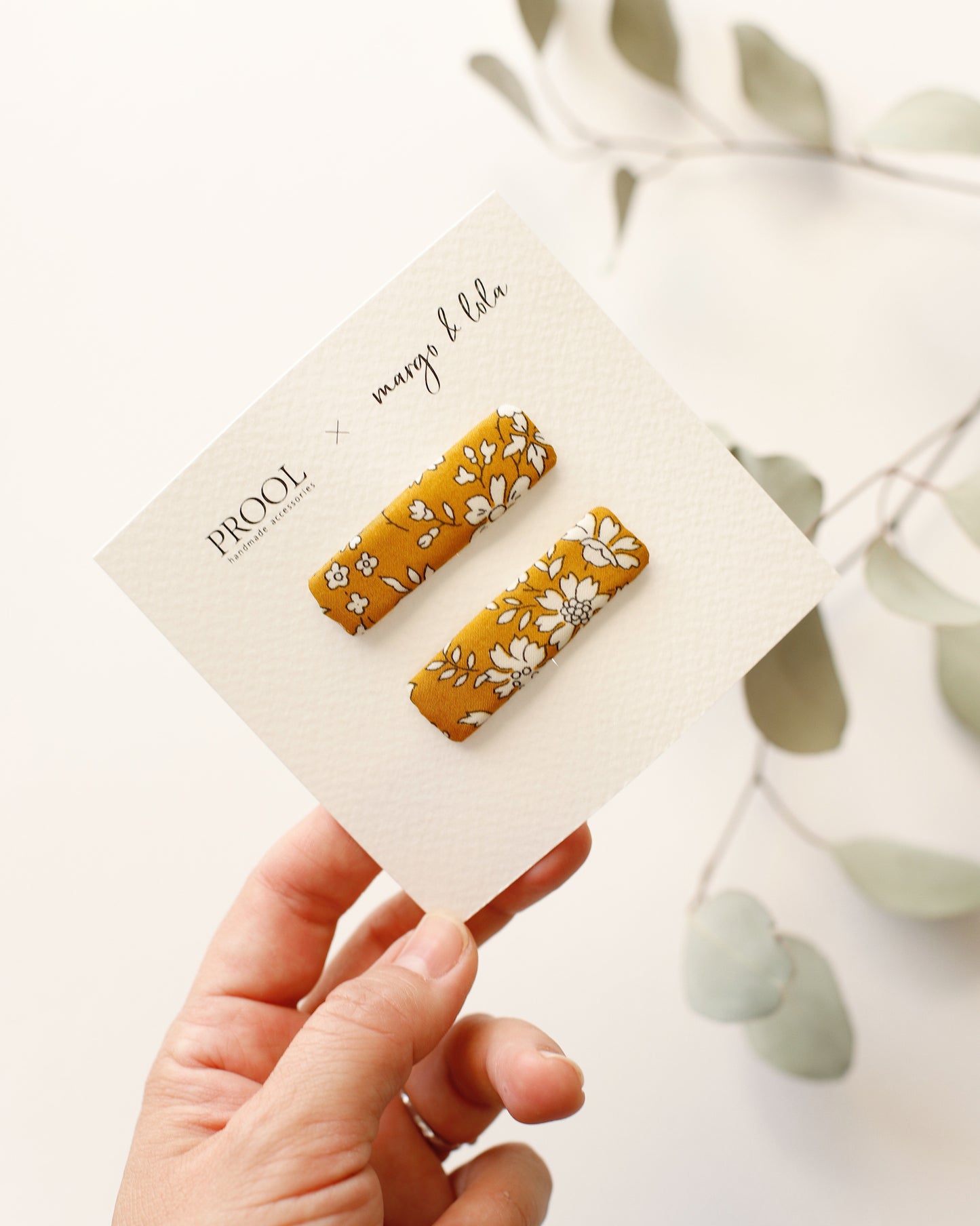 Kapica sa gombom Mila + dve PROOL šnalice na klik