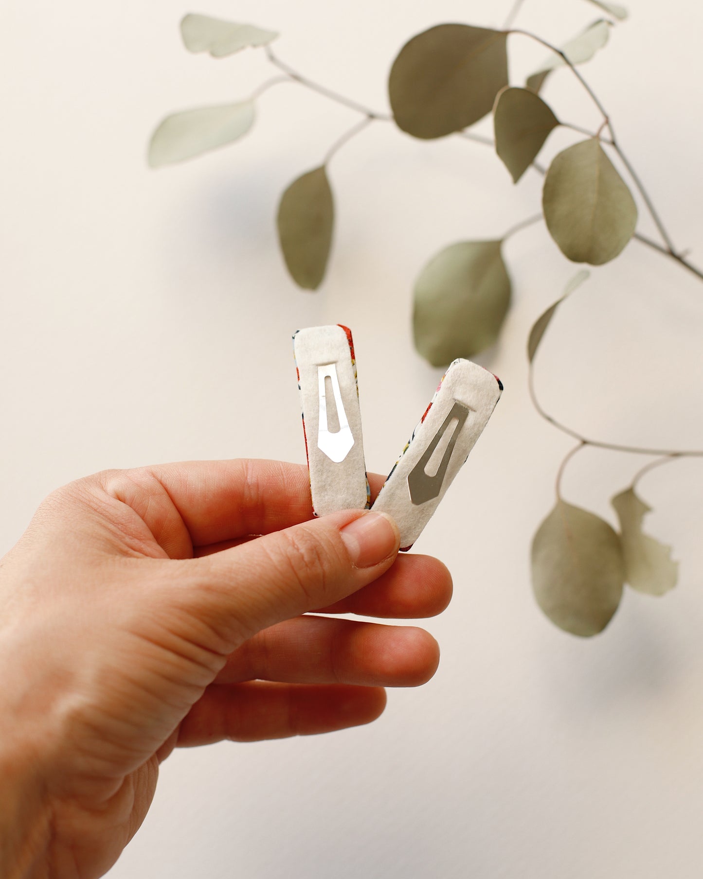 Kapica sa gombom Val + dve PROOL šnalice na klik